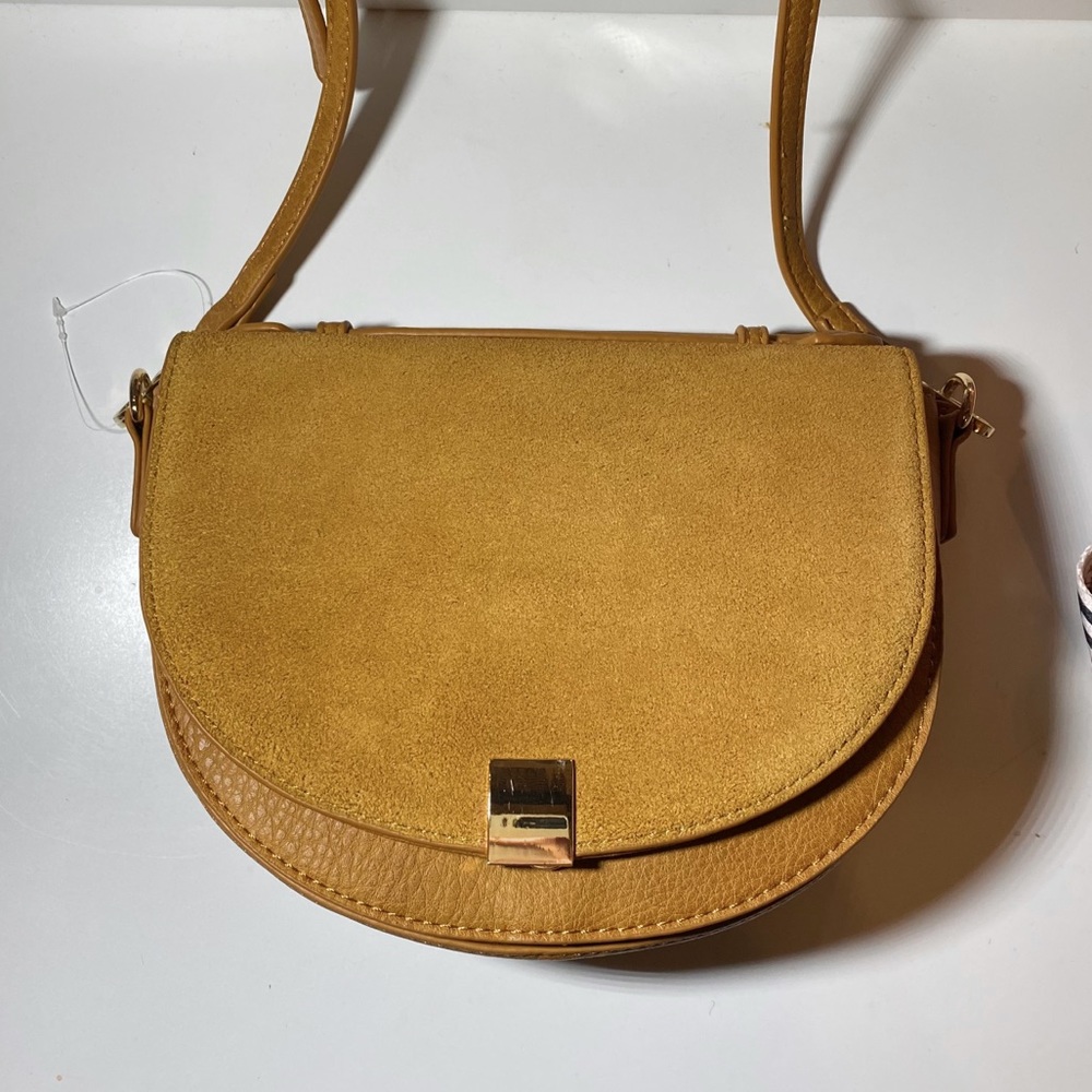 Madison West Leather Flap Round Cross Body